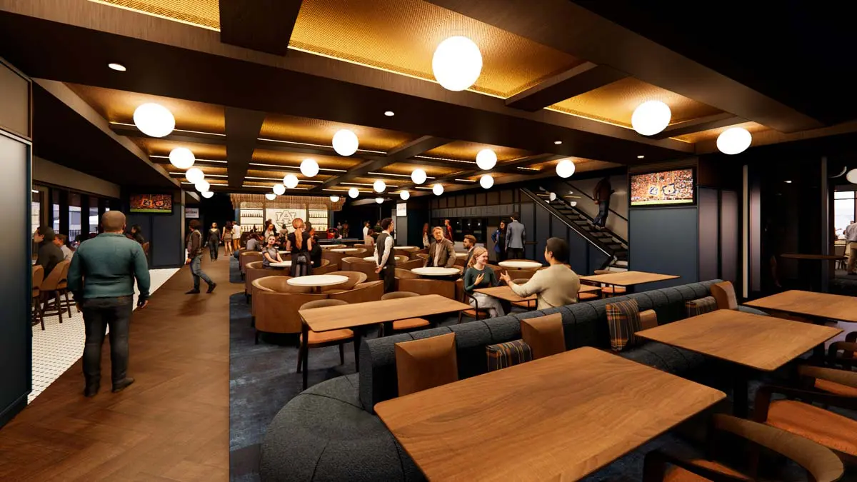 Rendering of the 1892 Legacy Room expanded view with booth seating, globe lights, bar, and staircase