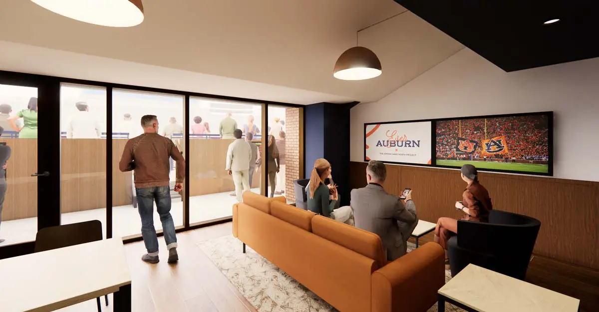 Rendering of a Stadium-View Meeting Room lounge with sofa seating, large screen, and glass doors to the stadium