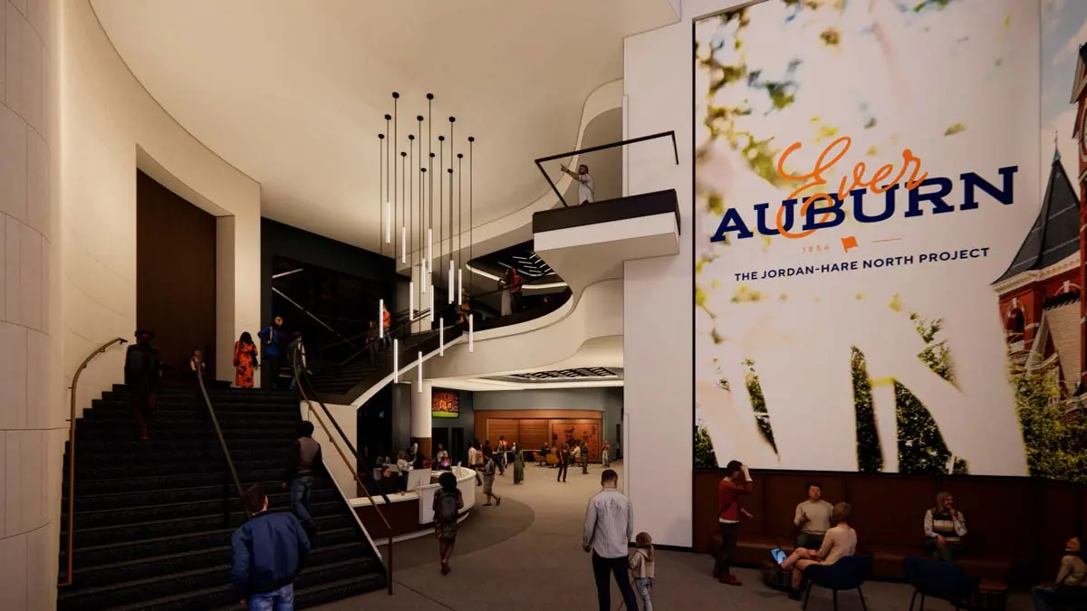 Rendering of study space with collaborative seating, pendant lighting, and Auburn branding