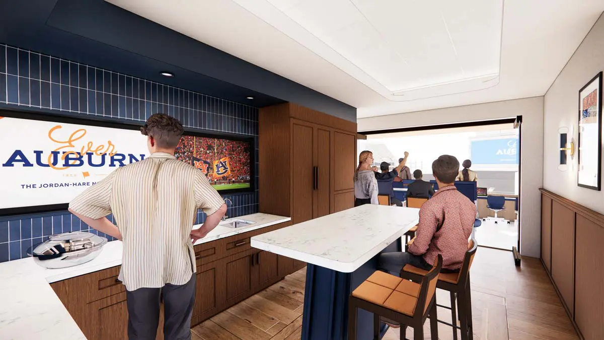 Rendering of an 1892 Suite with catering counter, wall-mounted screen, and views to outdoor seating