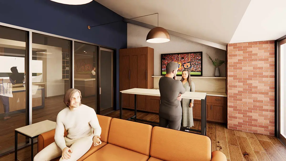 Rendering of a Kick Six Field Suite interior with lounge seating, television, and sliding doors to the outdoor terrace